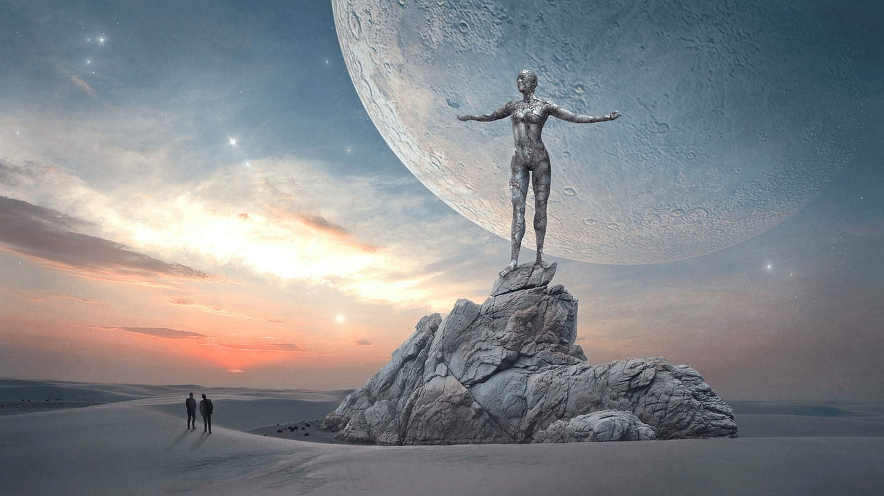 Photoshop fantasy image. Foreground, an enormous statue hewn from rock of a naked woman with her arms outstretched to either side; to the lower left, two small people stand as silhouette, looking up at it. Background, a huge icy snowy landscape, empty into the distance but for the statue, and a sky showing sunset colors with an enormous moon, very close to the planet, hanging behind the statue.